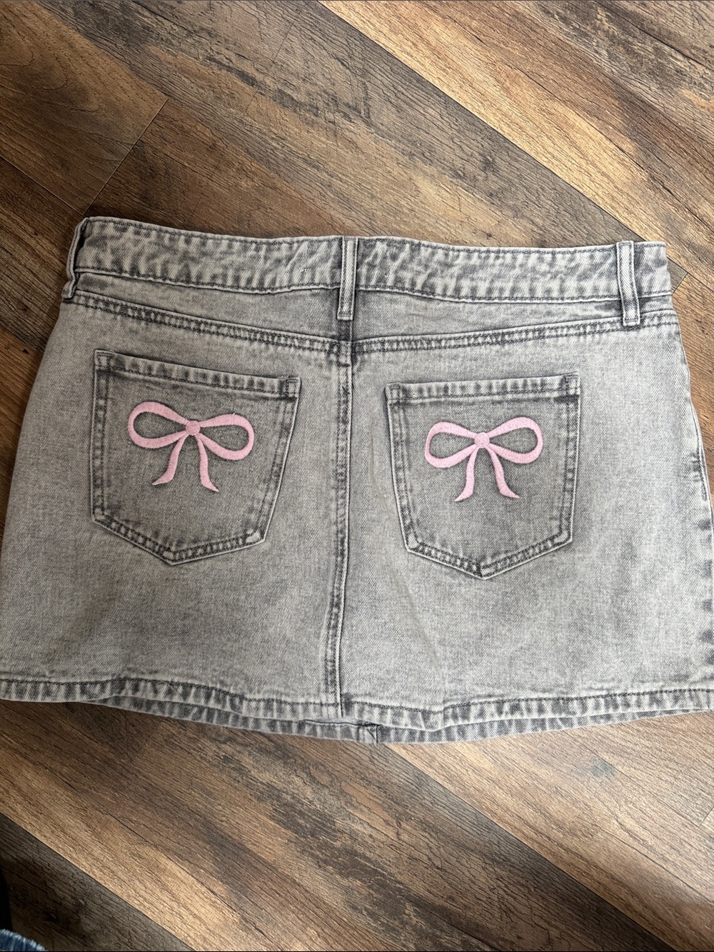 Ashley Mason Gray Denim Mini Skirt with Pink Bow Pockets